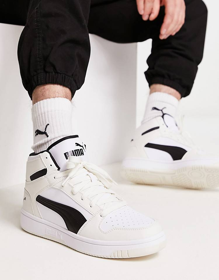 Puma Rebound Layup sneakers in white with black detail